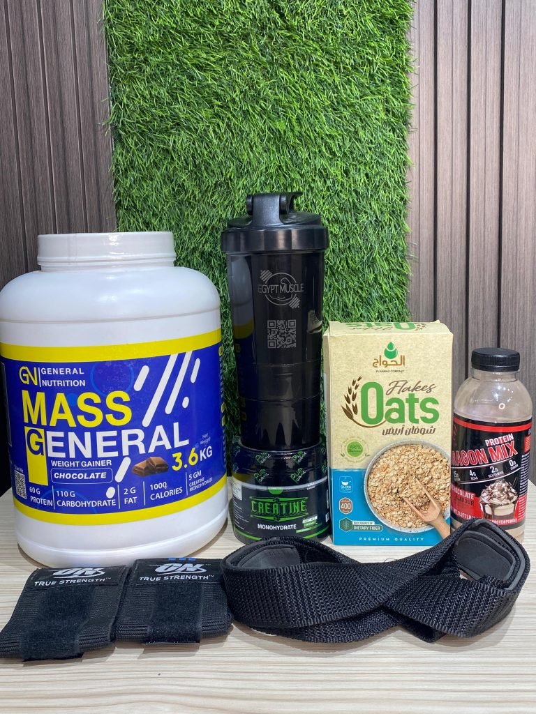 بوكس الضخامة 6 يحتوي على ماس جينرال نيوتريشن 3.5 كجم، كرياتين بيورجانيك، شيكر سمارت، شوفان، بوتيل بروتين، شداد، مدعم رسغ، وكارت خدش – عرض مكملات متكامل للضخامة العضلية من Egypt Muscle."